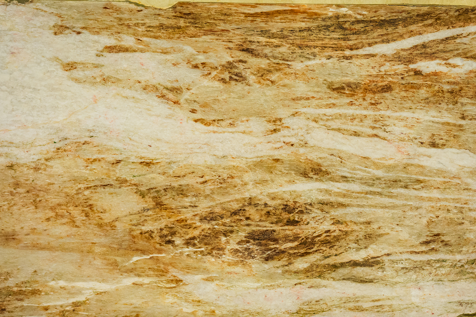 Close-up of sealed white marble island after marble stain removal, showing how to clean marble countertops and keep them protected.